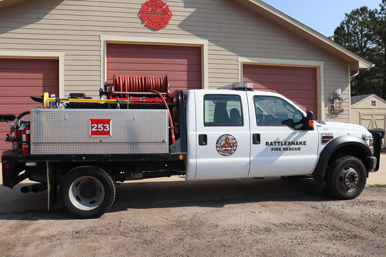 Brush 253 parked in front of Station 253