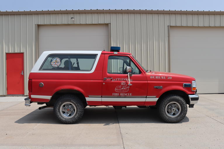 Bureau 251 parked in front of Station 251