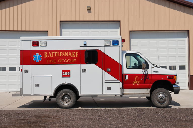 Medic 255 parked in front of Station 255